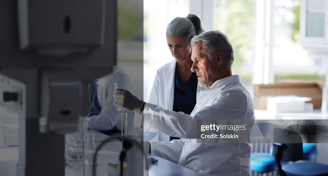 Scientists working together in laboratory.