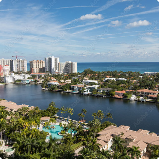 Arial view of Aventura Florida waterway Canal with luxury homes.