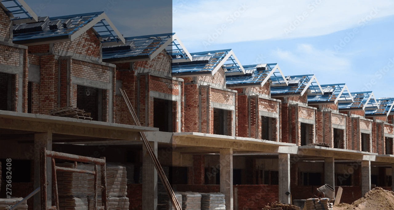 Double story luxury condominium homes under construction.